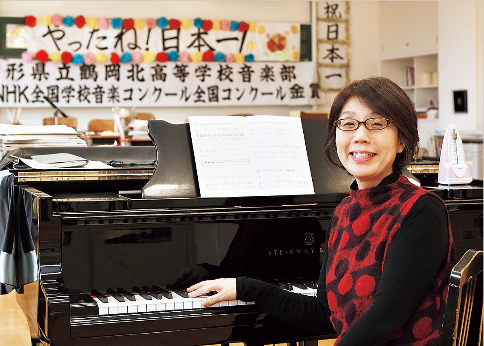 音楽部を率いて27年、強豪抑えて日本一。